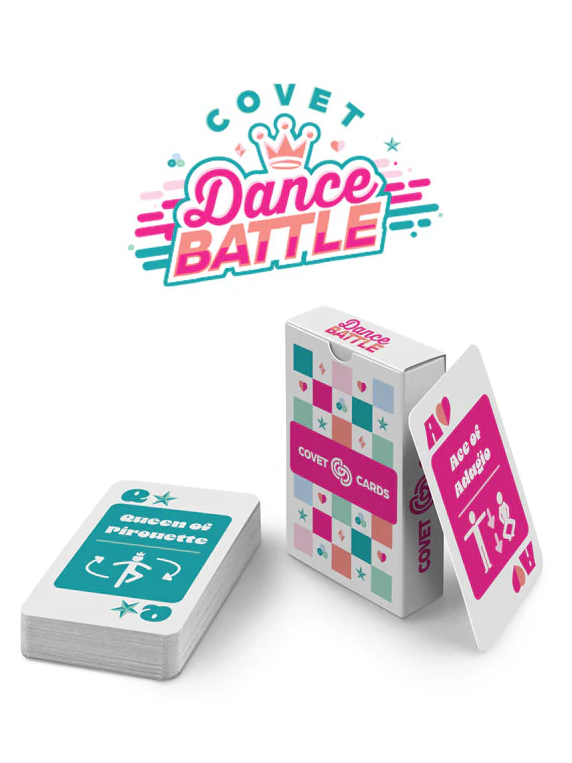 
                      
                        A logo appears at the top "Covet Dance Battle." Below is the deck of cards laying down, top card in turquoise, featuring "Queen of Pirouette" challenge. The box stands next the the deck with a hot pink Ace of Adagio card leaning against it.
                      
                    