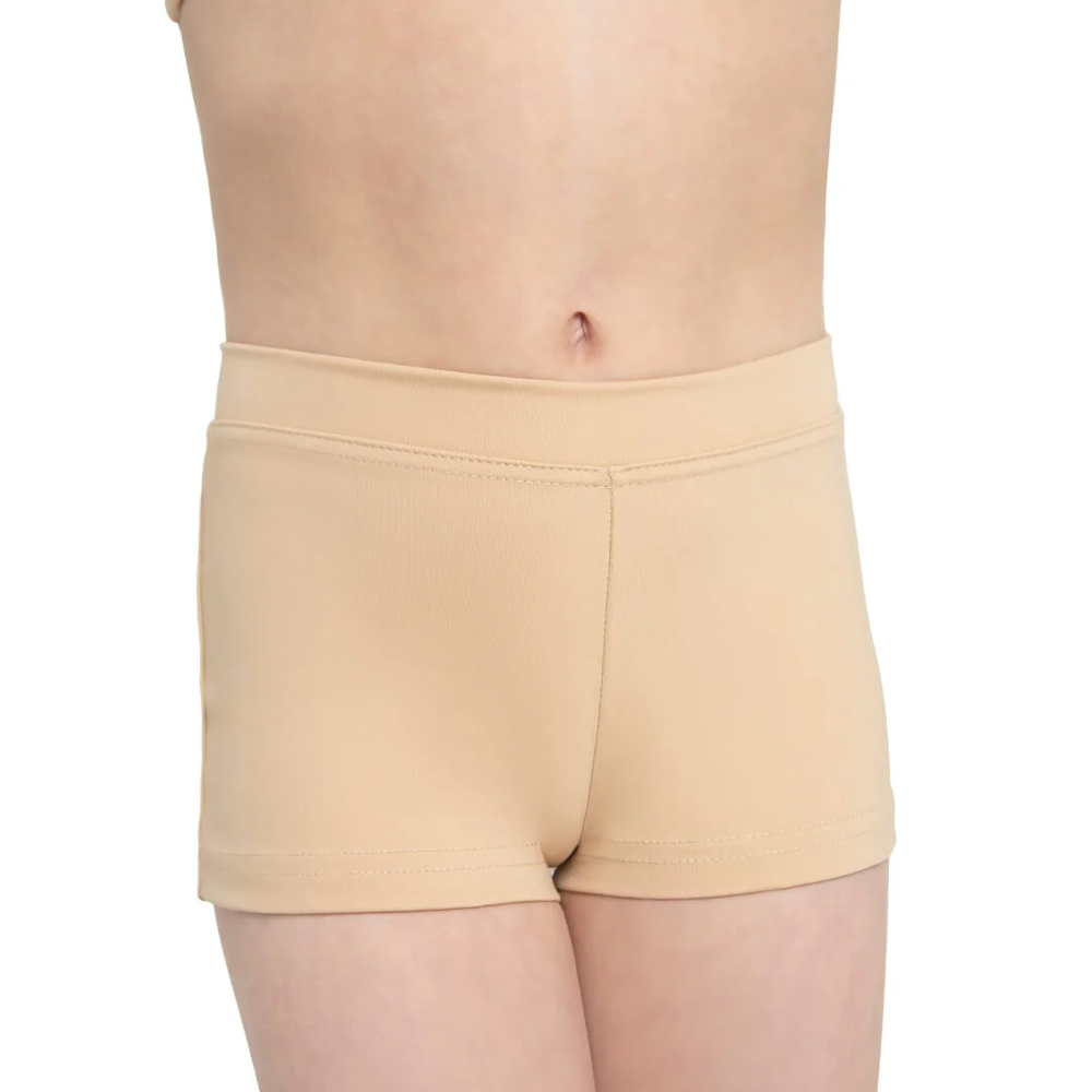 
                      
                        A close-up of a child's torso wearing a pair of nude colored dance shorts.
                      
                    