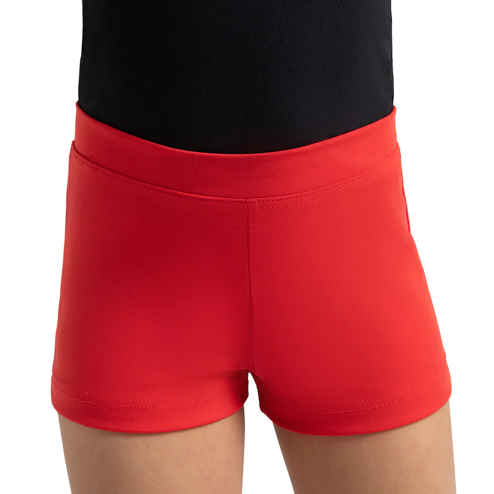 
                      
                        A close-up of a child's torso wearing a pair of red dance shorts over a black leotard.
                      
                    